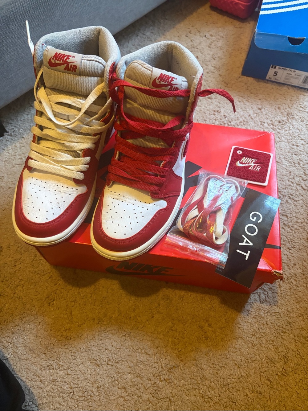 Jordan Retro High Top Sneakers in White and Red